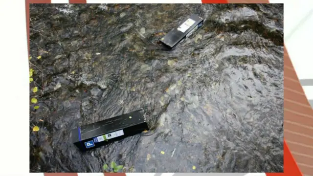 Parking ticket machines in river