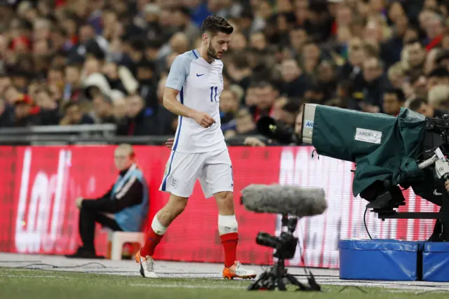 Adam Lallana walks off injured