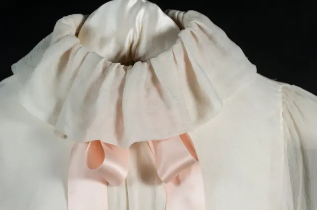 Pale pink Emanuel blouse with large bow worn by Diana