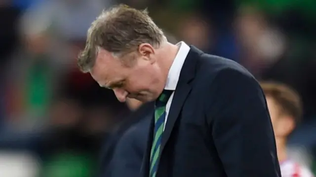 Michael O'Neill looks disappointed at full-time