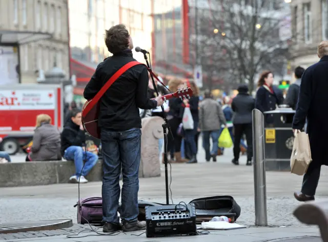 Busker performing