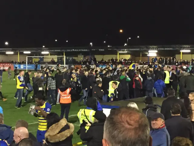 Fans carry their captain Liam Daly on their shoulders