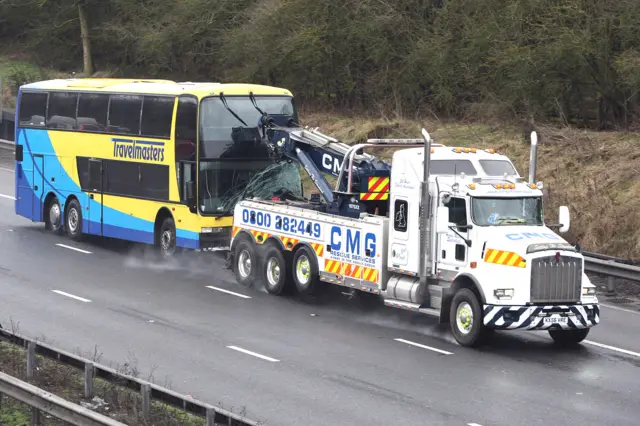 Coach and recovery vehicle