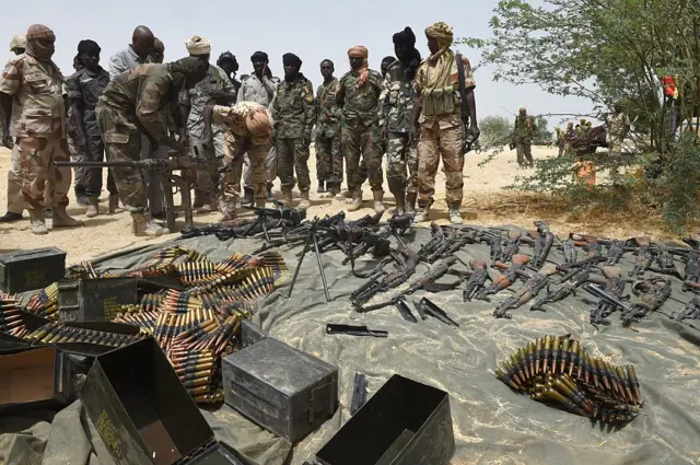 Chadian soldiers display arms captured from Boko Haram militants