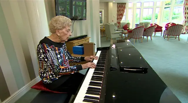 Trudi playing the piano