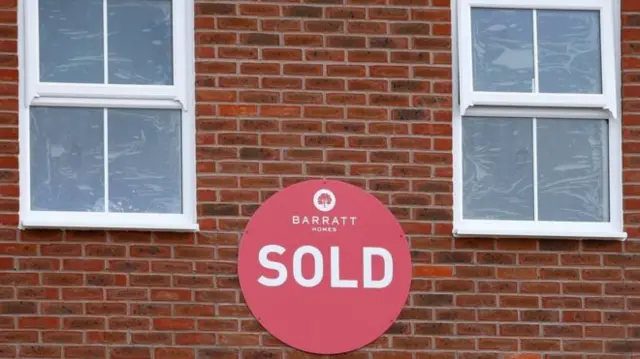 A Barratt home with a 'Sold' sign