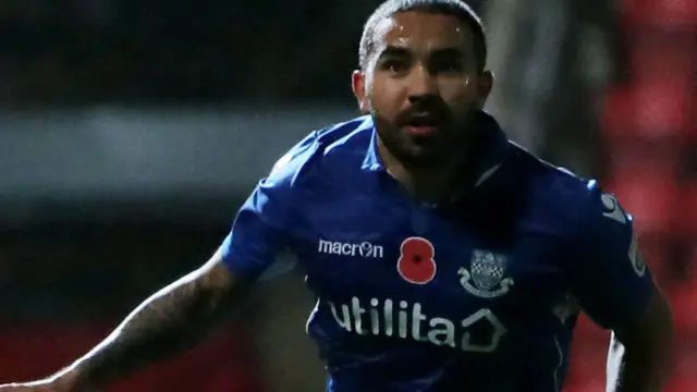Eastleigh midfielder Jai Reason celebrates scoring against Swindon