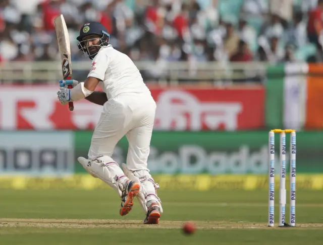 Pujara in action