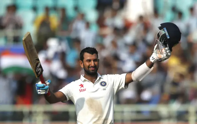 Pujara celebrates