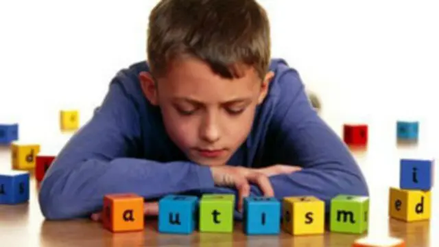 Boy with letter bricks