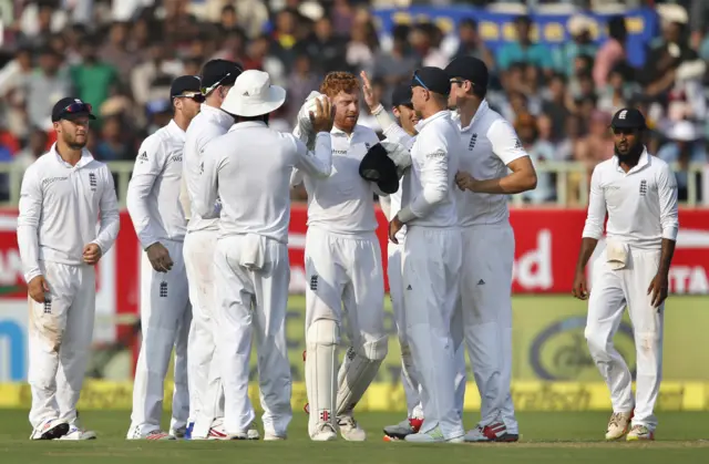 England celebrate Pujara's dismissal