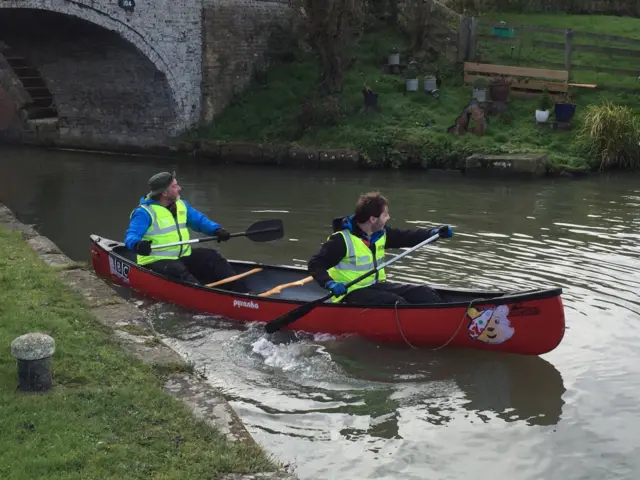 Andy Collins and Danny Fullbrook in a canoe