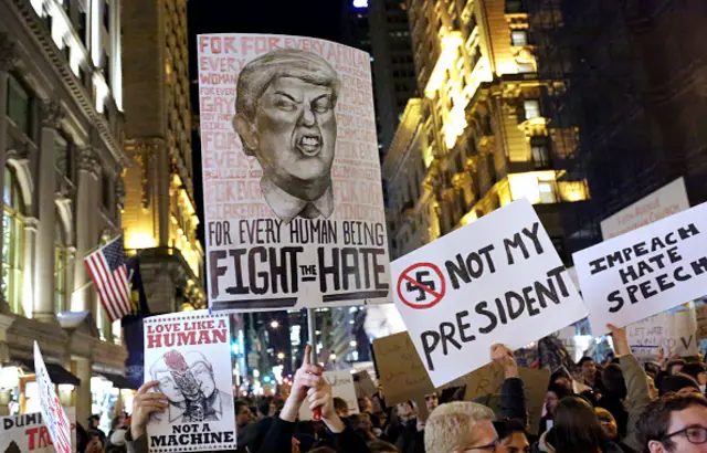 A crowd marches from Union Square to Trump Tower in protest of new Republican president-elect Donald Trump on November 12, 2016 in New York, United States.