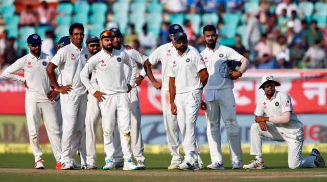 India players wait for the umpire's decision for the wicket of England's Moeen Ali