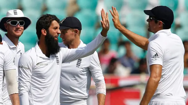 Moeen Ali celebrates with his teammates