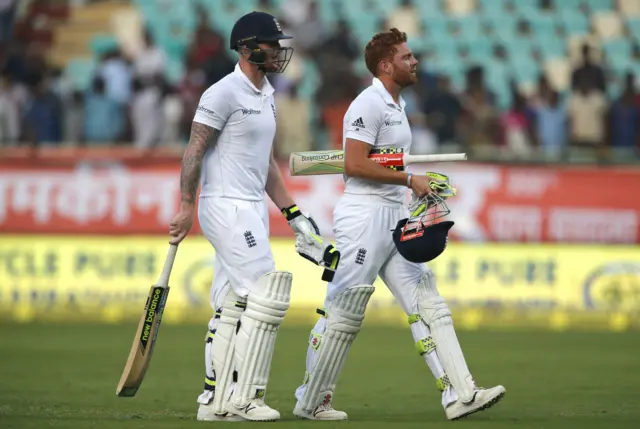 England's Ben Stokes and Jonny Bairstow leave the ground after the end of the day's play