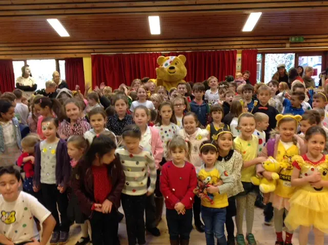 Pudsey with children and staff at Ickworth