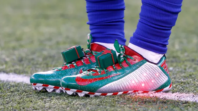 A detailed view of the Christmas themed sneakers of Odell Beckham of the New York Giants