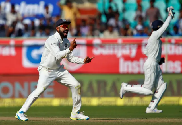 India captain Virat Kohli celebrates the dismissal of Haseeb Hameed