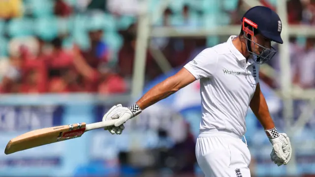 Cook swings the bat as he leaves the pitch