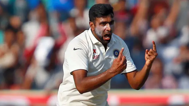 India's Ashwin celebrates Root's wicket