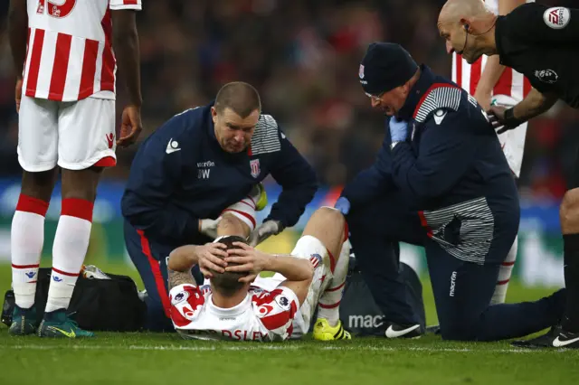 Phil Bardsley receives treatment