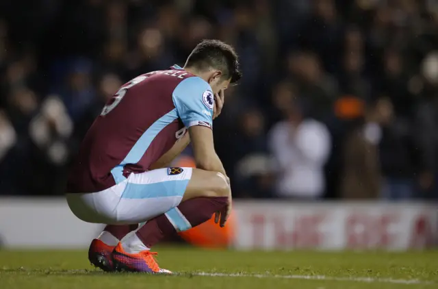 Aaron Cresswell looks dejected