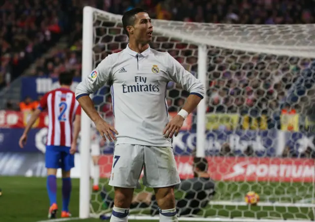 Cristiano Ronaldo celebrates scoring their third