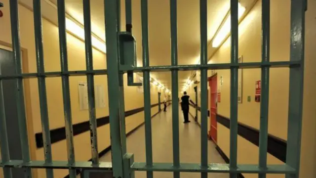 Interior of jail through bars