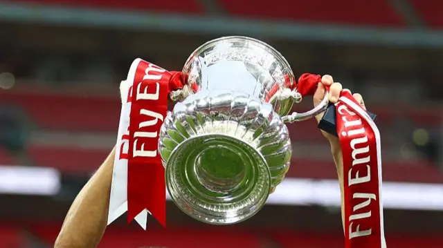 The FA Cup being lifted last season