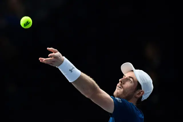 Andy Murray serves