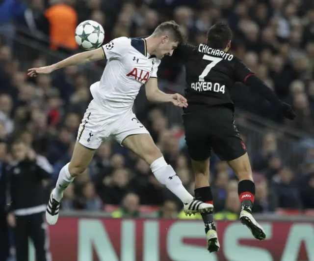 Javier Hernandez heads the ball