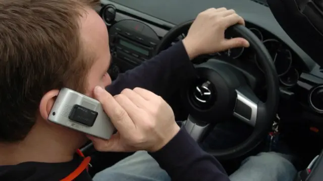 Driver on mobile phone