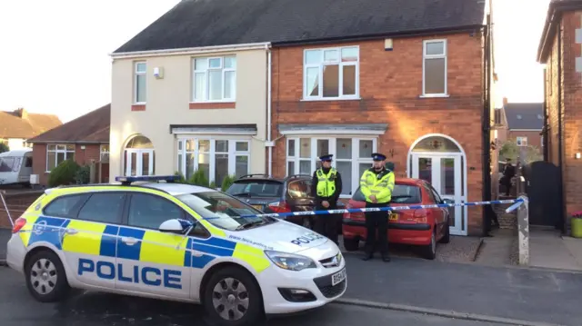 House and police cordon in Hinckley