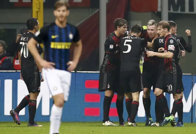 Suso celebrates with teammates