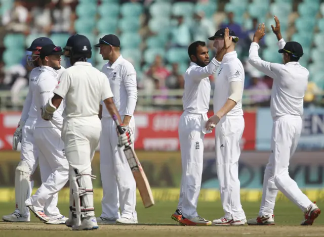 England's Rashid celebrates