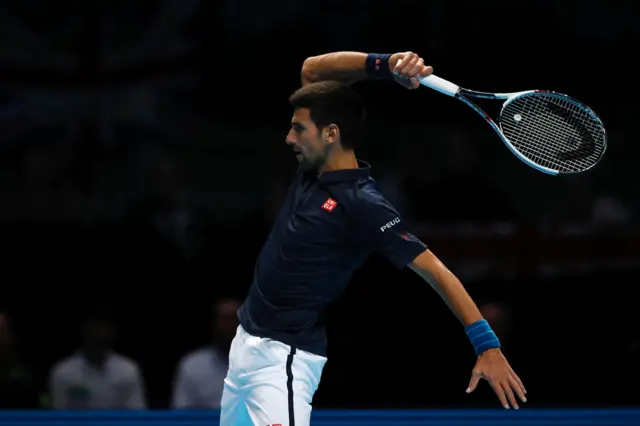 Novak Djokovic hits a return