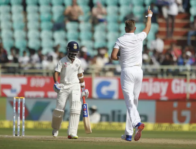 India's Rahane is caught behind off England's Stuart Broad's bowling