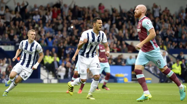 Nacer Chadli celebrates scoring against West Ham