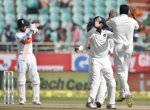 England's Joe Root survives a review