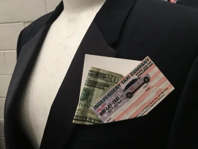 The jacket will dollar bill and taxi card