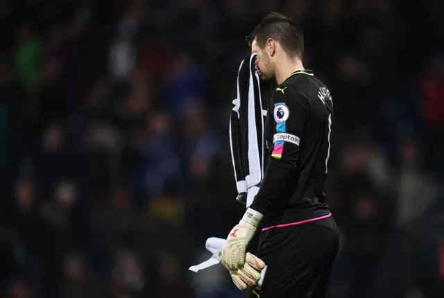 Tom Heaton of Burnley looks dejected