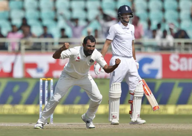 India's Shami celebrates the wicket of Joe Root