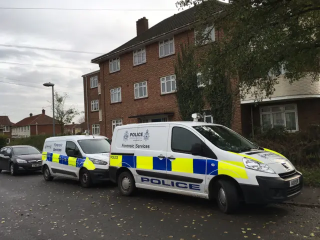 Police forensic vehicles in Saffron Square