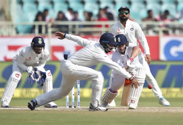 England's Joe Root drives the ball