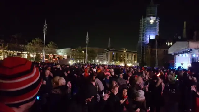 Crowds in city park in Bradford