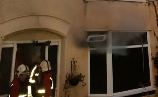 Firefighters attending house fire