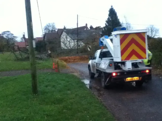 Fallen tree blocks road in Besthorpe, with engineers and vehicle on site