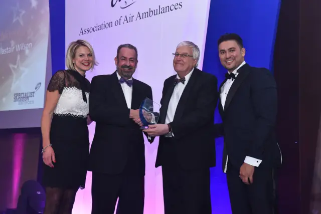 Alastair Wilson with his award