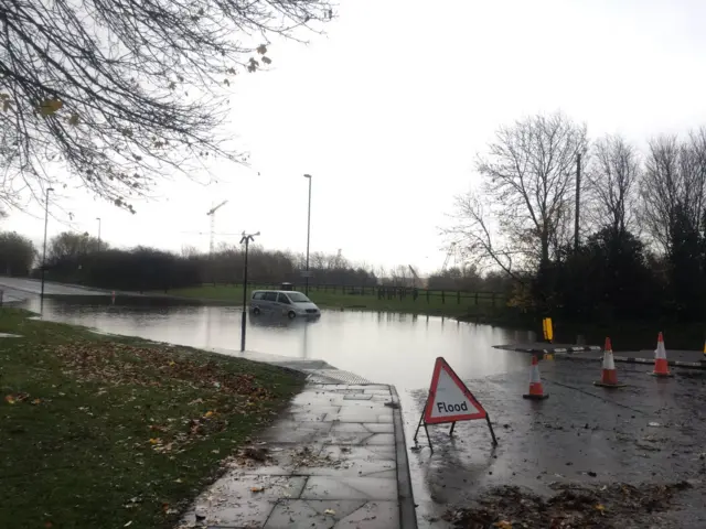 A taxi stuck in the water